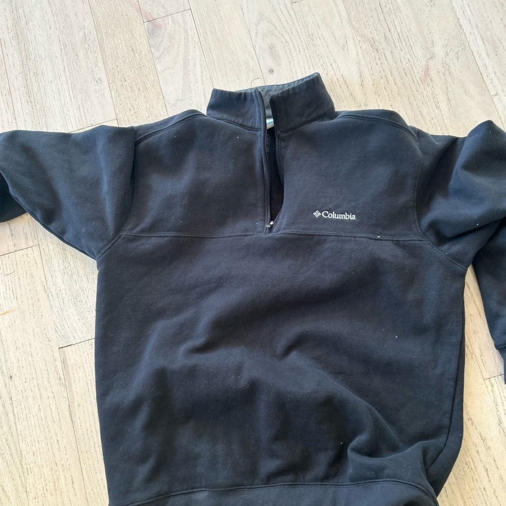 Colombia black half zip up. Size M